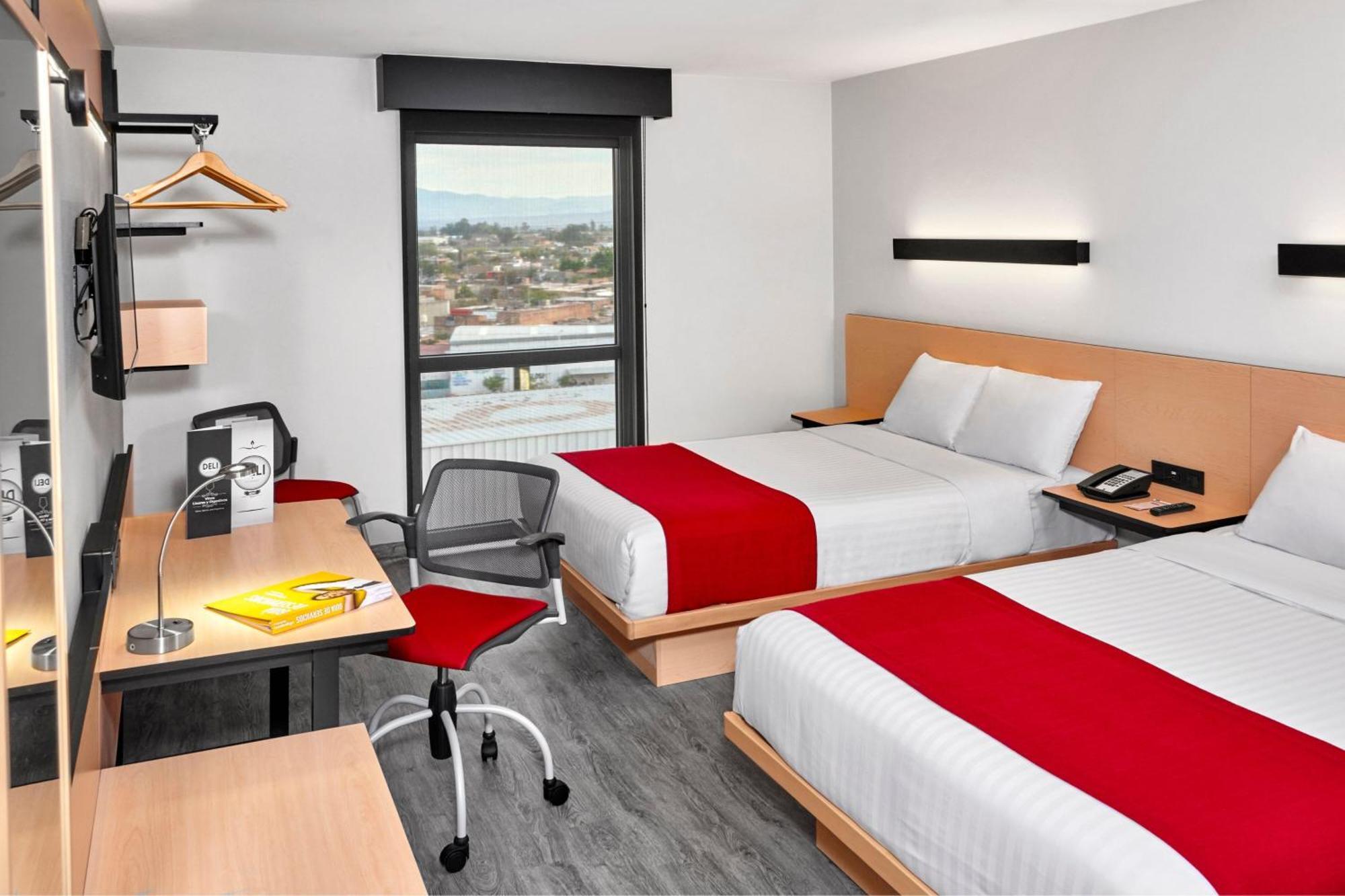 Quarto Duplo com 2 Camas de Casal